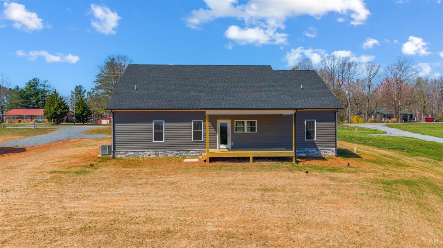 10578 Leesville Road Lynch Station, VA 24571 - Photo 38 of 54 a backyard of a house with barbeque oven