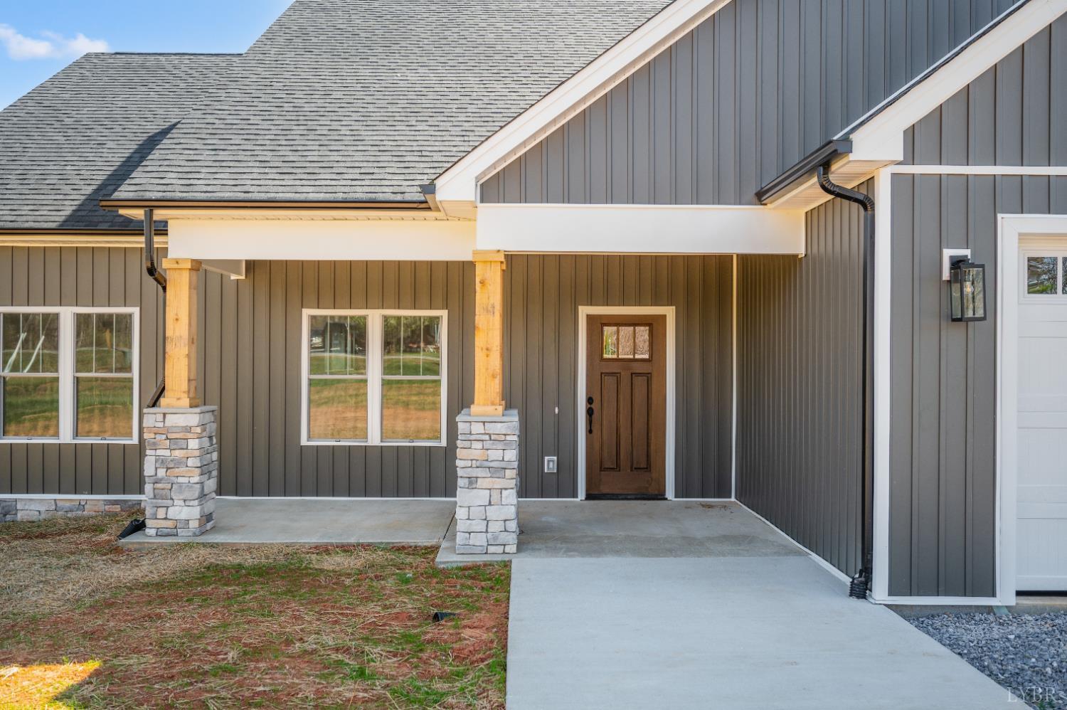10578 Leesville Road Lynch Station, VA 24571 - Photo 48 of 54 a view of house with backyard porch and outdoor seating