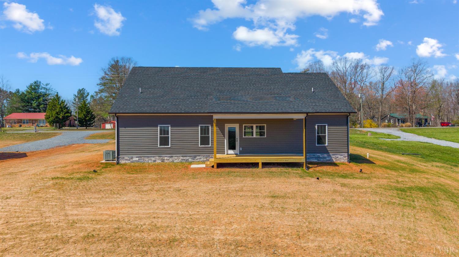 10578 Leesville Road Lynch Station, VA 24571 - Photo 50 of 54 a backyard of a house with barbeque oven