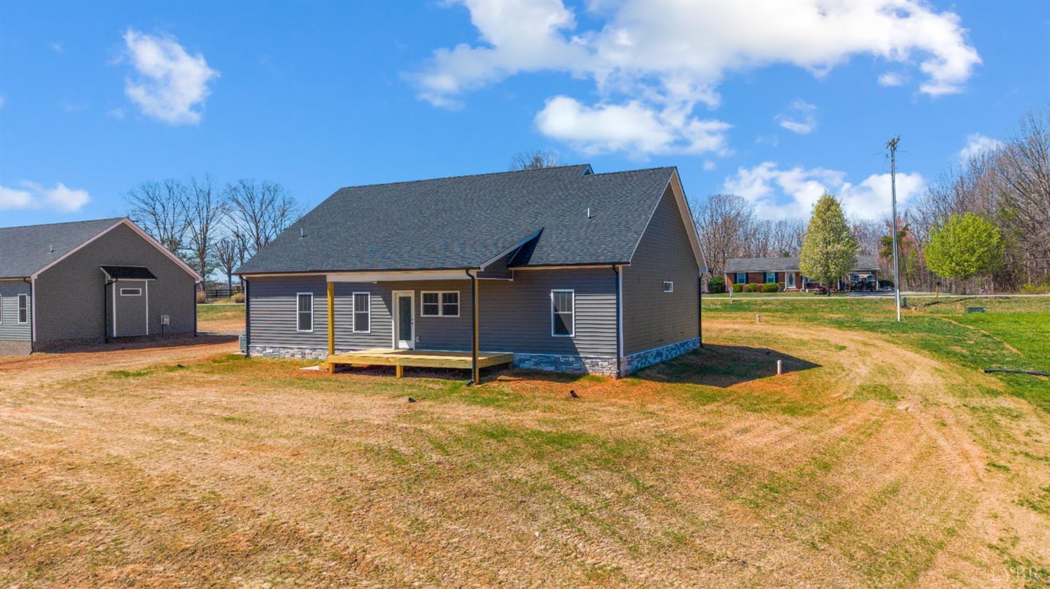 10578 Leesville Road Lynch Station, VA 24571 - Photo 52 of 54 a view of a house with swimming pool and sitting area