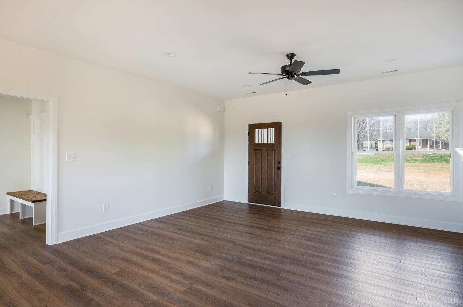 10578 Leesville Road Lynch Station, VA 24571 - Photo 6 of 54 wooden floor in an empty room with a window