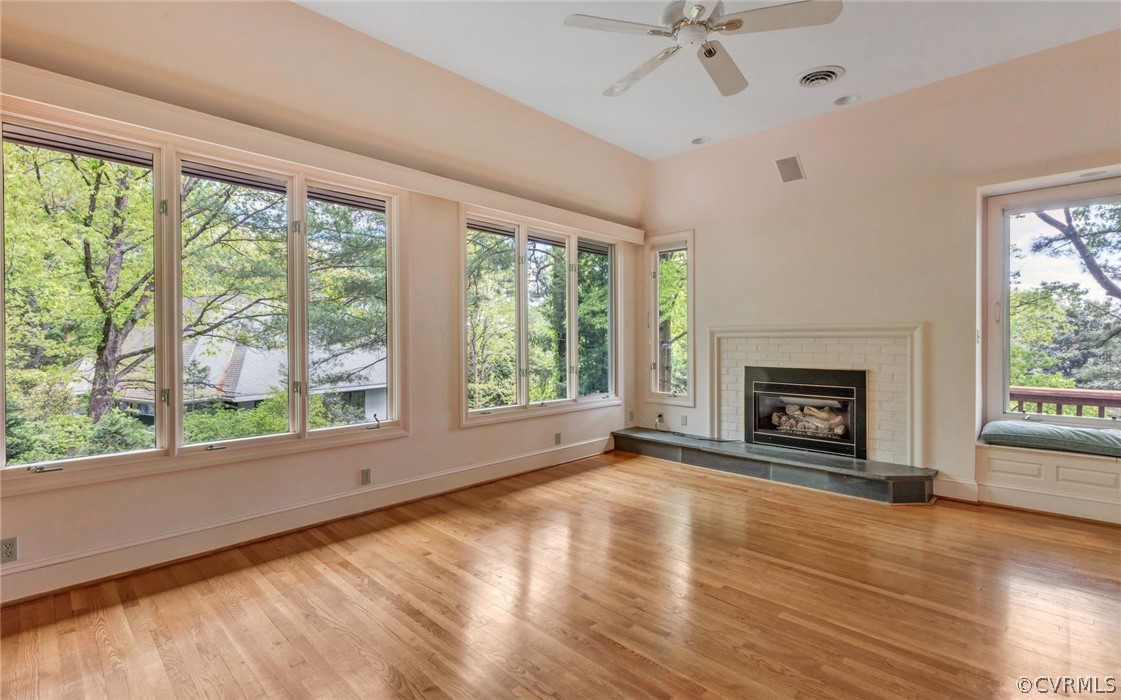 8911 Highfield Road Henrico, VA 23229 - Photo 12 of 43 Family room with fireplace and tray ceiling. Lots