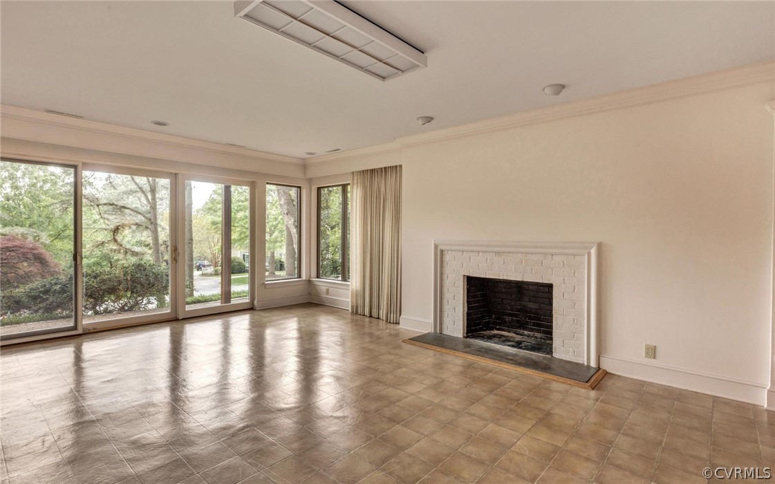 8911 Highfield Road Henrico, VA 23229 - Photo 26 of 43 Rec room with fireplace. Walk-out to the fabulous