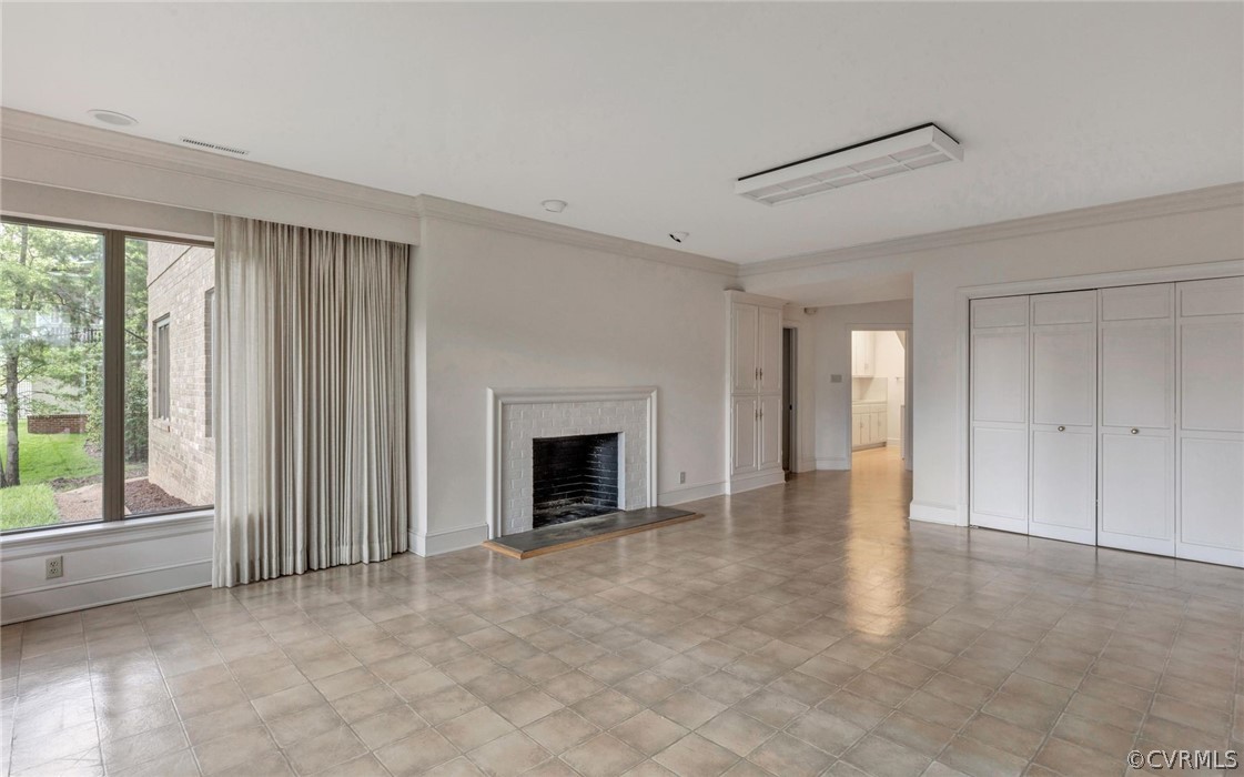 8911 Highfield Road Henrico, VA 23229 - Photo 27 of 43 Large rec room with FP, abundant windows, glass sl