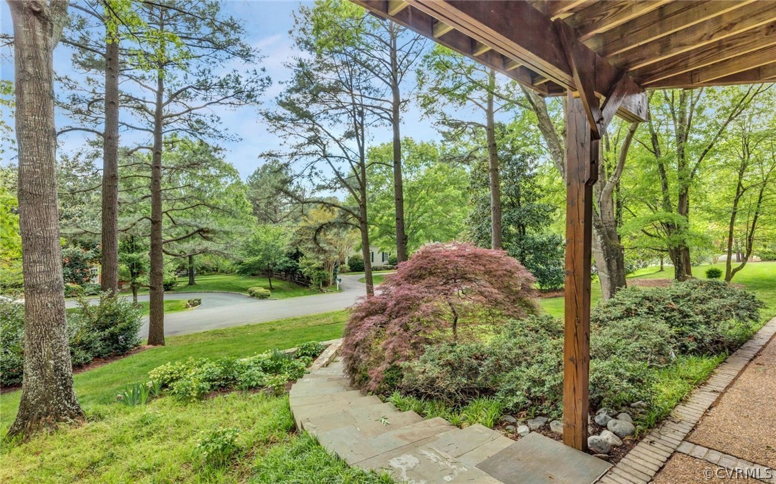 8911 Highfield Road Henrico, VA 23229 - Photo 36 of 43 Patio under the deck and walkway to the back yard.