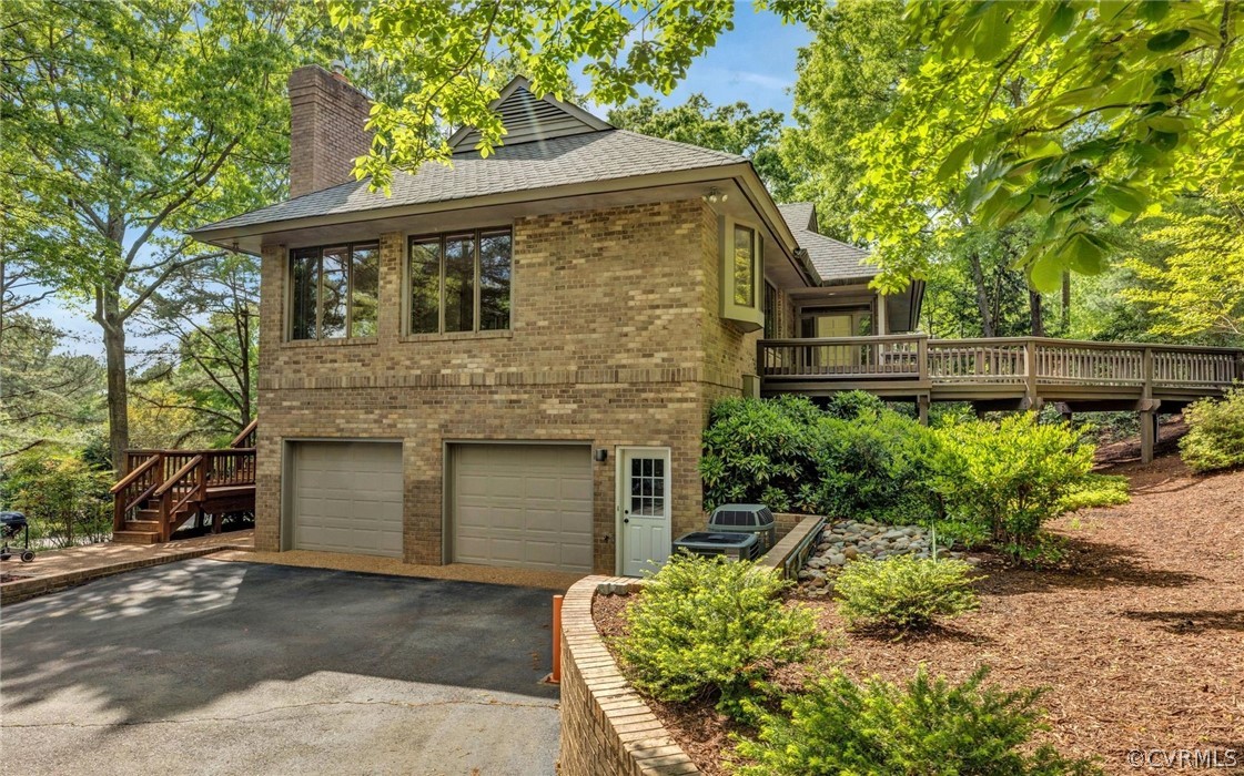 8911 Highfield Road Henrico, VA 23229 - Photo 39 of 43 Two-car oversized garage and driveway.