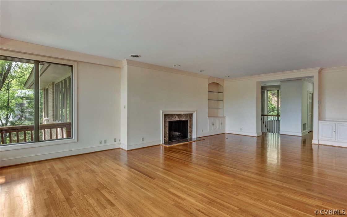 8911 Highfield Road Henrico, VA 23229 - Photo 8 of 43 Living room looking towards the front hall. Crown