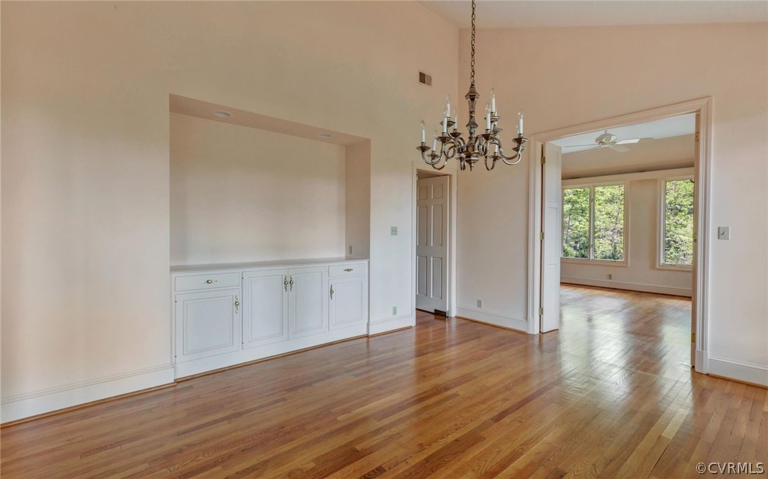 8911 Highfield Road Henrico, VA 23229 - Photo 10 of 43 Dining room with door to kitchen and opening to th