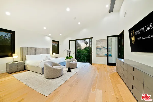 a bathroom with a sink and a large mirror