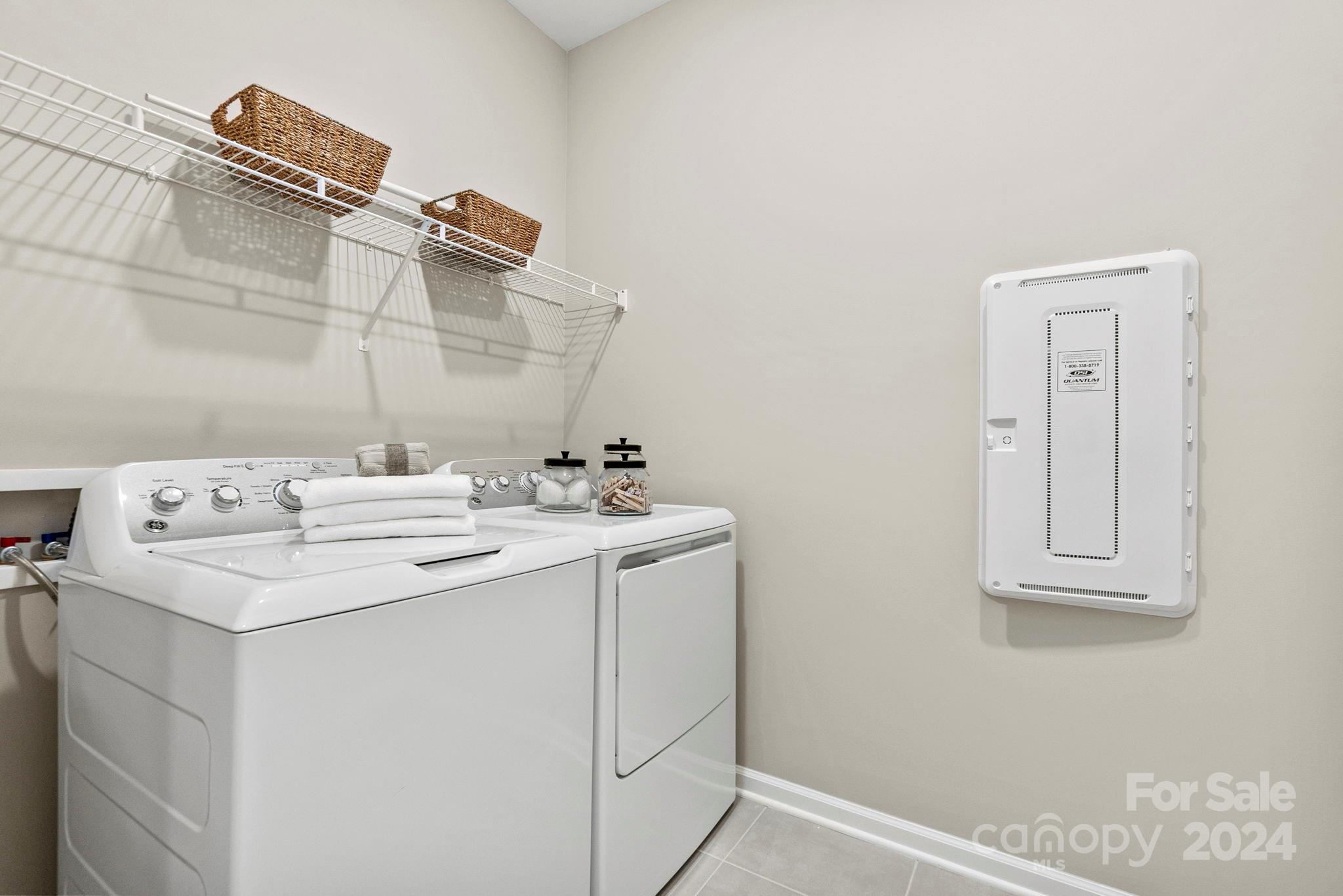 13229 Chopin Ridge Road Huntersville, NC 28078 - Photo 24 of 34 a utility room with dryer and washer