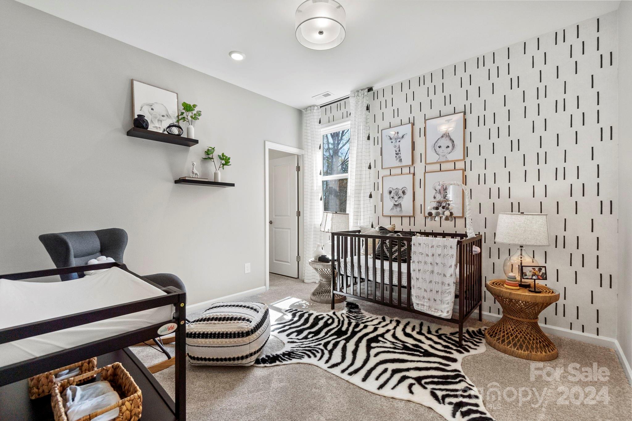 13229 Chopin Ridge Road Huntersville, NC 28078 - Photo 26 of 34 a bedroom with furniture and a window