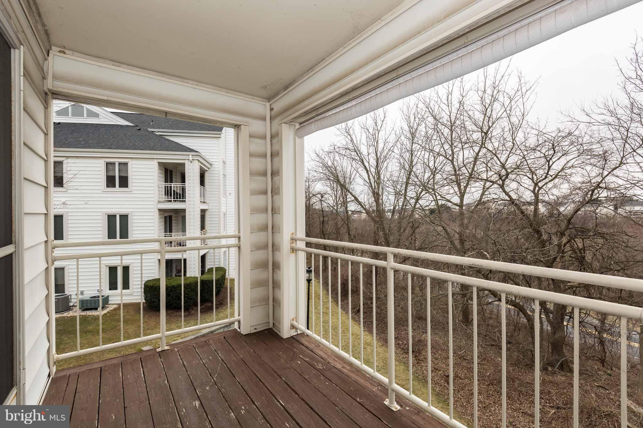 345 Pleasanton Road, Unit A32 Westminster, MD 21157 - Photo 28 of 29 Private Deck overlooks trees