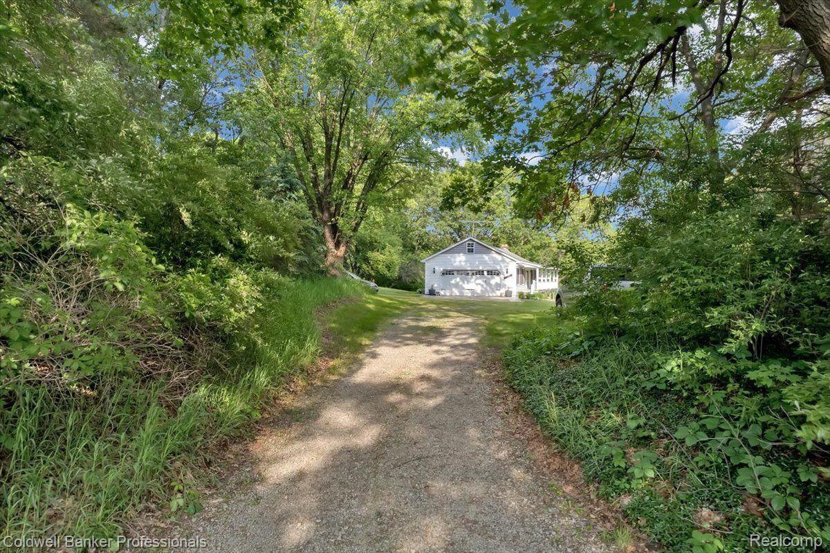 3931 Hosner Road Dryden, MI 48428 - Photo 38 of 40 Wooded Driveway