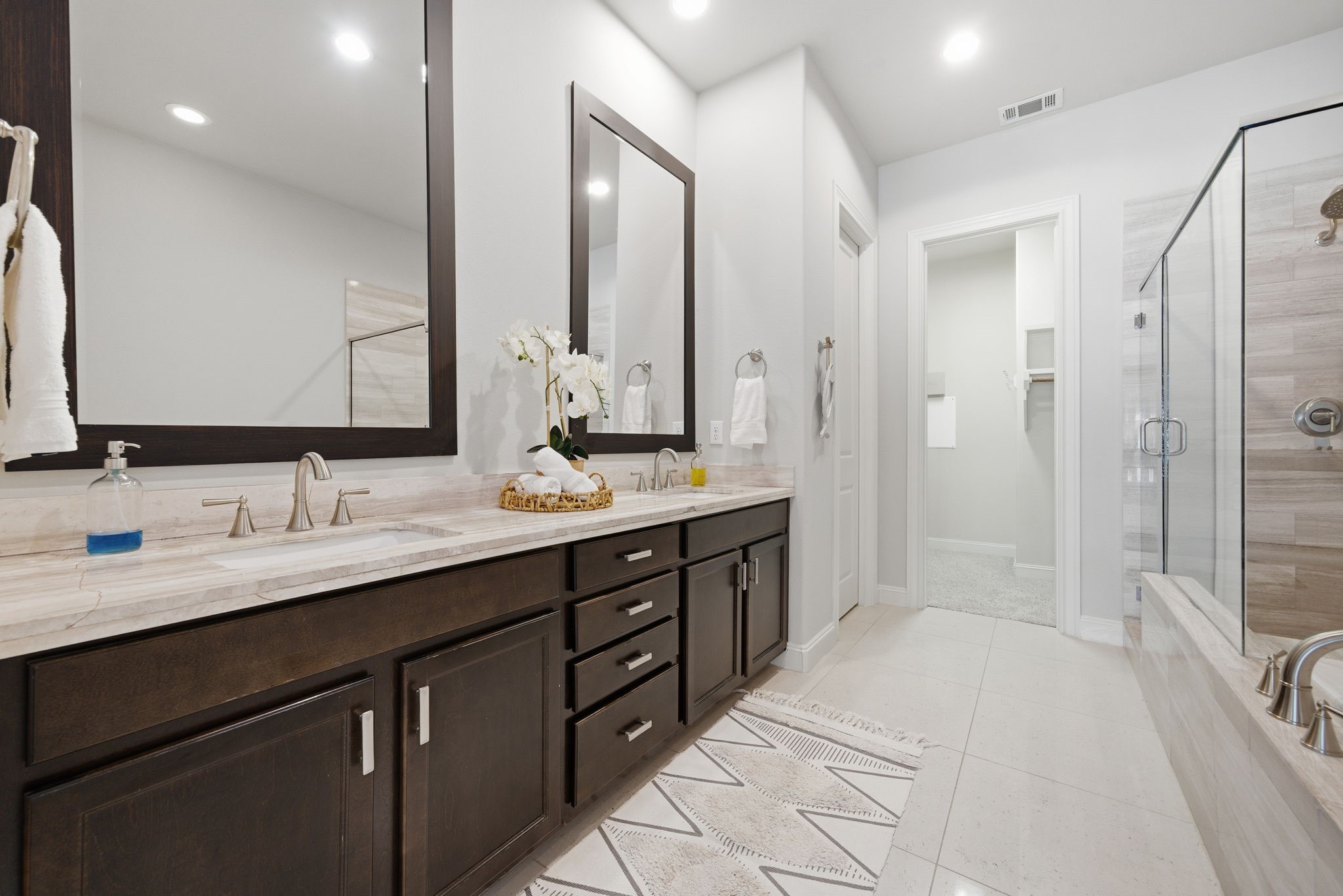 1360 West 25th Street Houston, TX 77008 - Photo 20 of 37 a bathroom with a double vanity sink mirror double and shower
