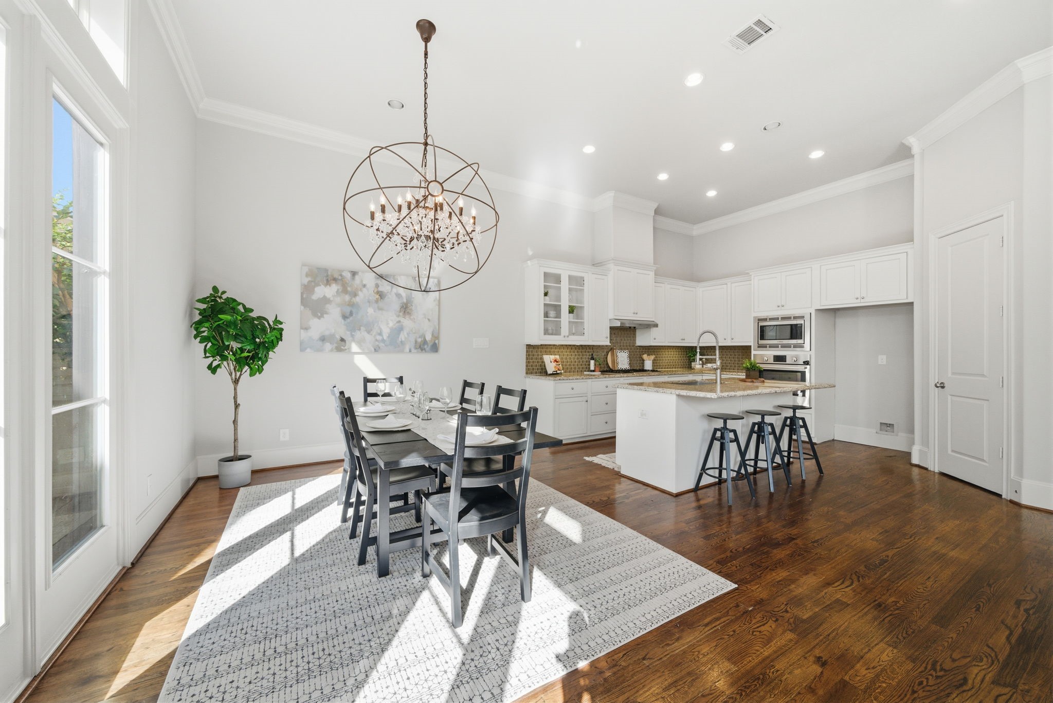 1360 West 25th Street Houston, TX 77008 - Photo 9 of 37 a view of a dining room with furniture window and wooden floor