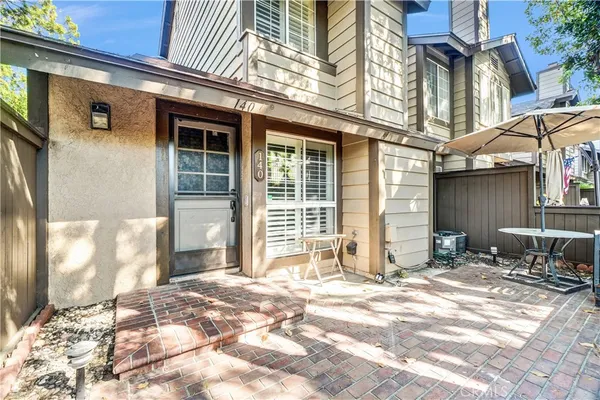 a view of a house with a patio