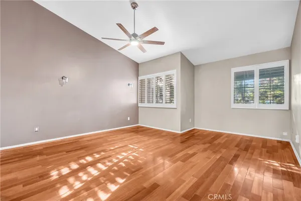 a view of an empty room with a window