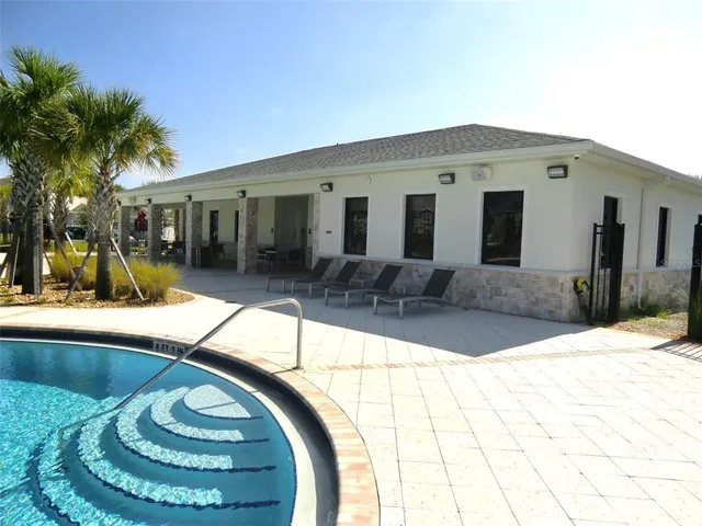 a view of a house with a swimming pool