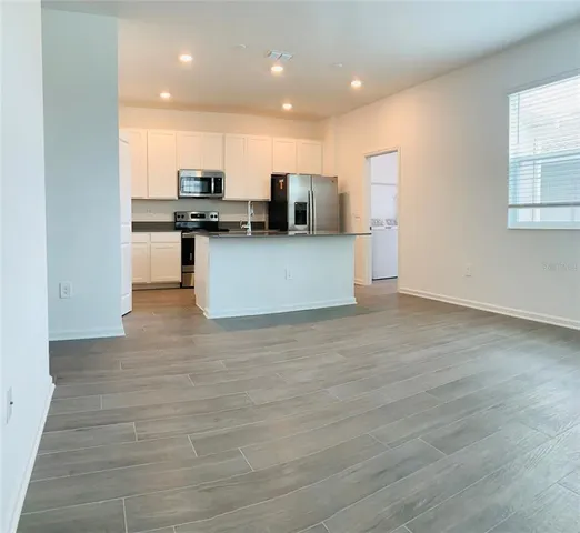 a view of a kitchen cabinets