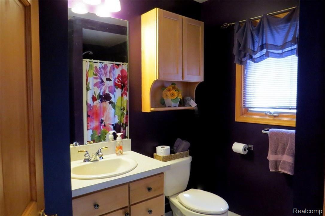 942 South Kern Road Fowlerville, MI 48836 - Photo 42 of 77 Half bath has extra storage as well. Tons of storage in this home.