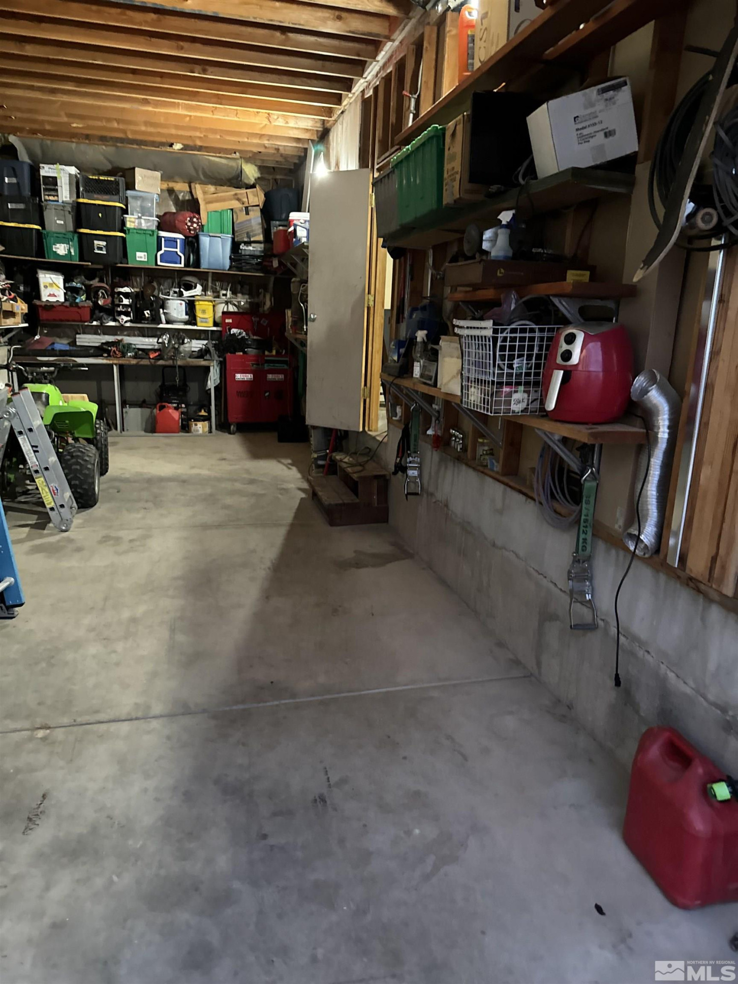 11595 Vicksburg Road Reno, NV 89508 - Photo 16 of 18 a view of a storage room with racks