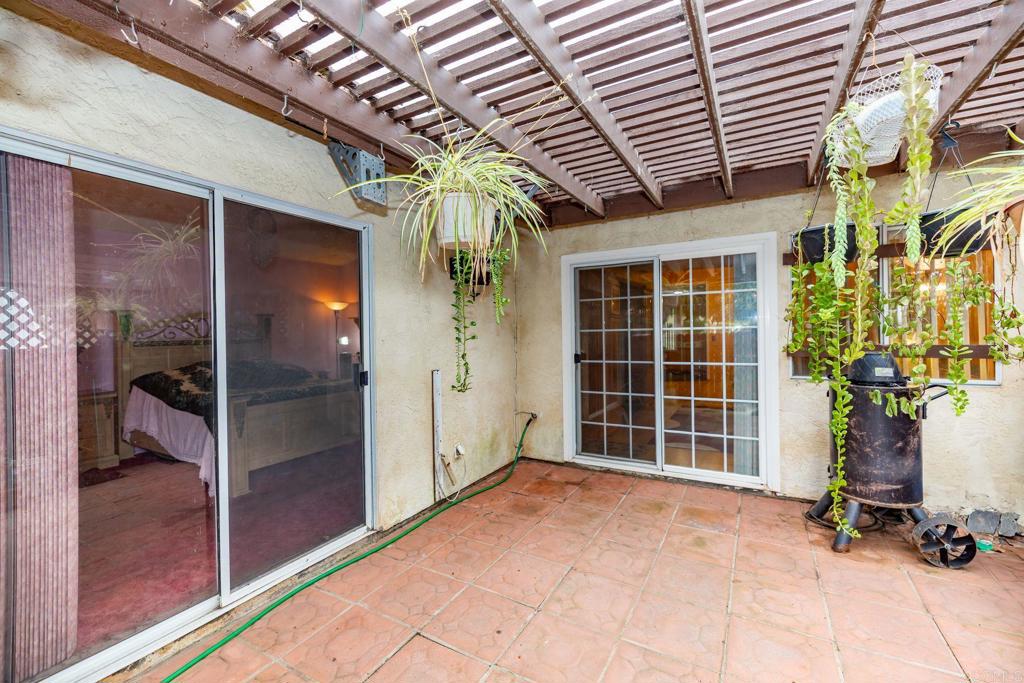 1518 Goldrush Way Oceanside, CA 92057 - Photo 16 of 36 a view of an entryway with a door