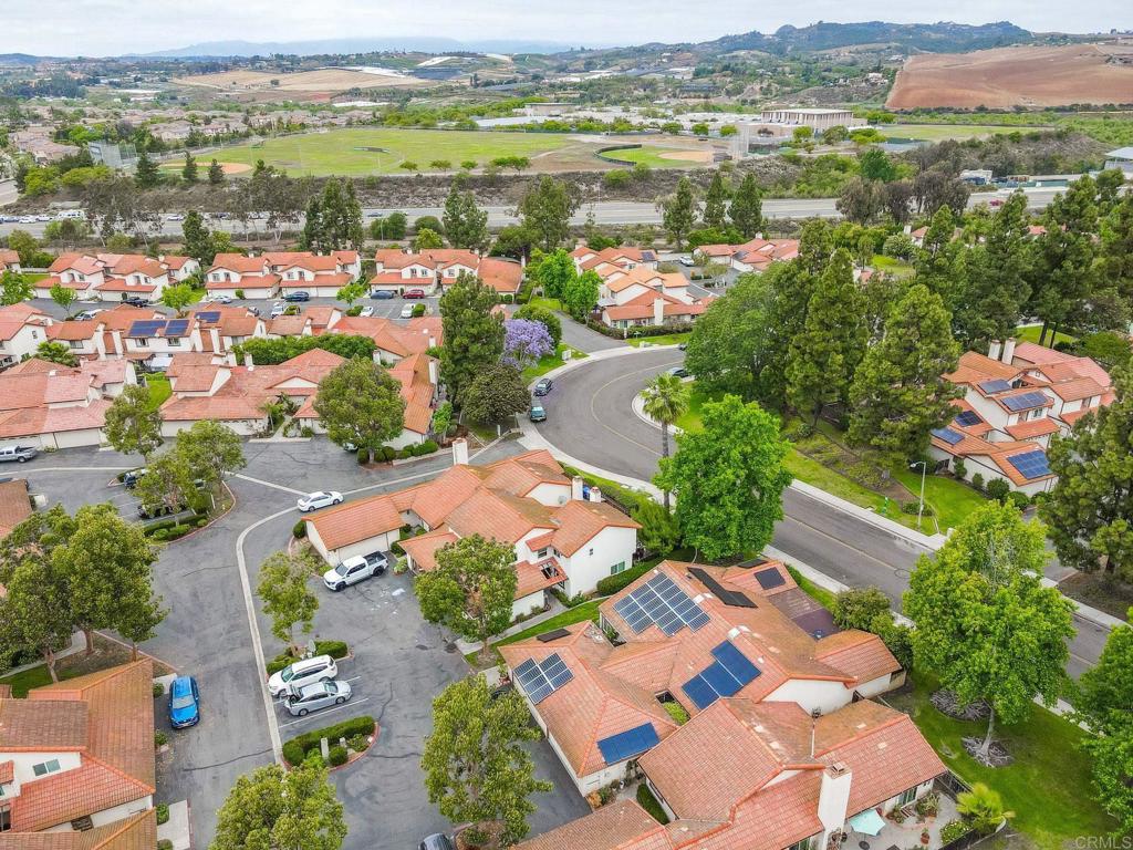 1518 Goldrush Way Oceanside, CA 92057 - Photo 27 of 36 an aerial view of lake and residential houses with outdoor space