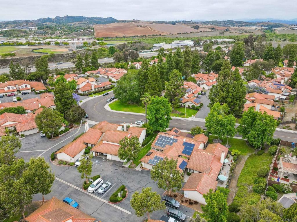 1518 Goldrush Way Oceanside, CA 92057 - Photo 28 of 36 an aerial view of lake and residential houses with outdoor space