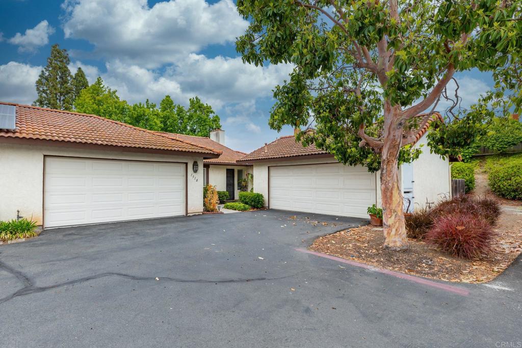 1518 Goldrush Way Oceanside, CA 92057 - Photo 32 of 36 a house with trees in the background