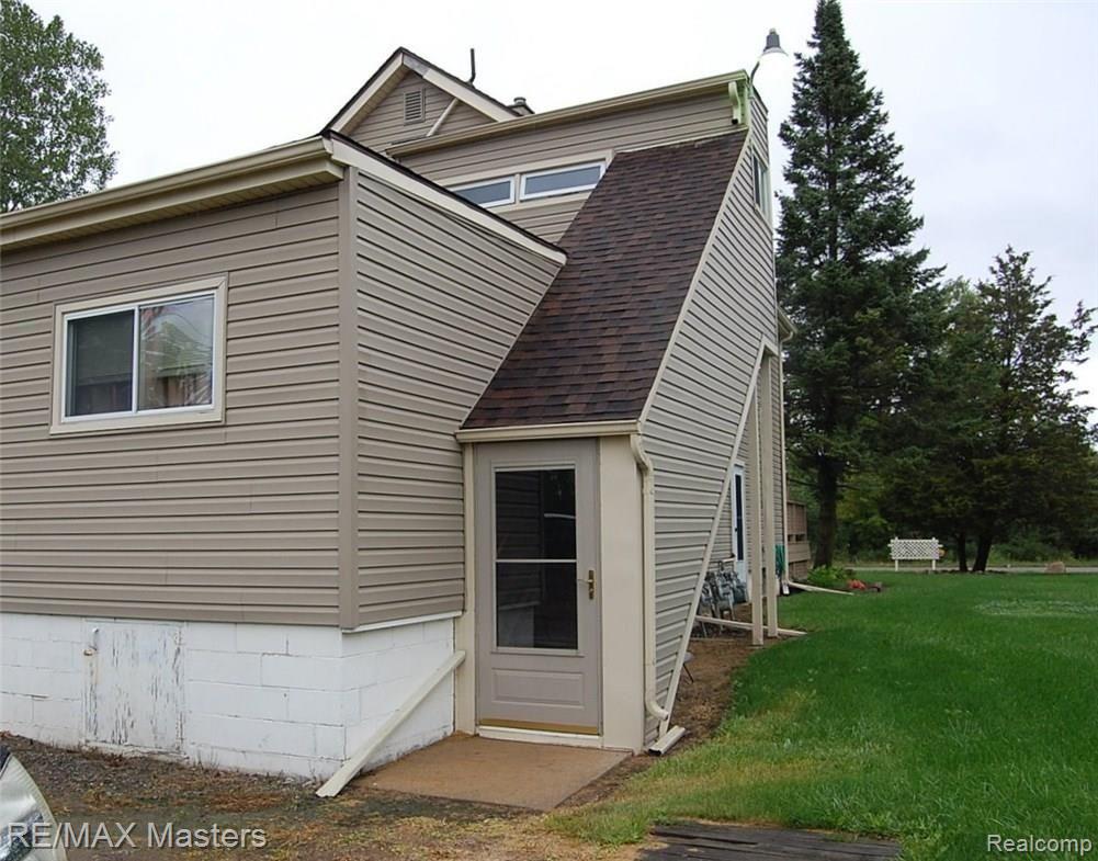 3994 Will Carleton Road Flat Rock, MI 48134 - Photo 12 of 24 ENCLOSED STAIRS TO UPSTAIRS UNIT