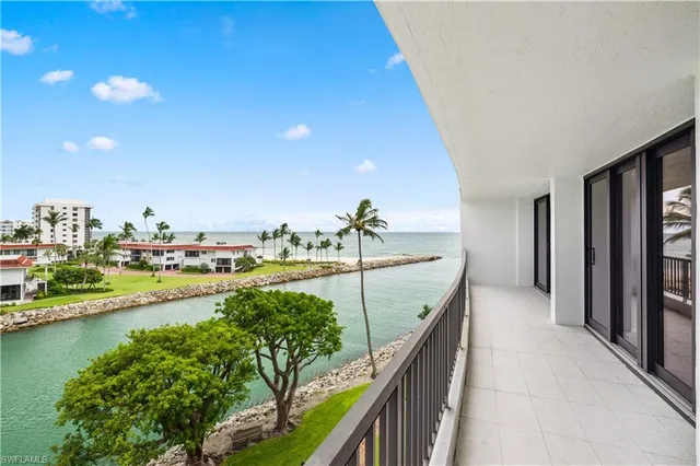 a view of swimming pool from a balcony