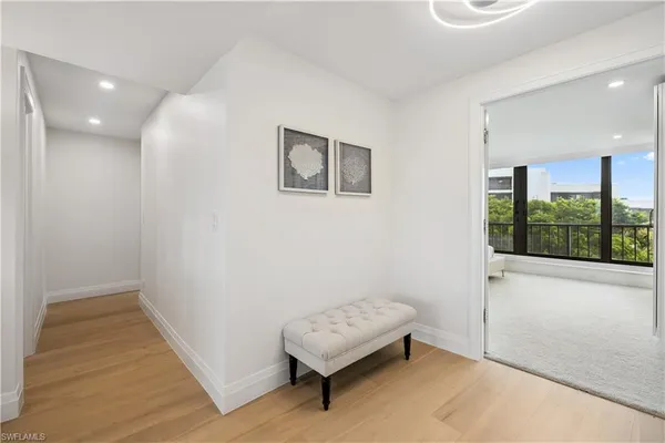 a living room with a couch and a window