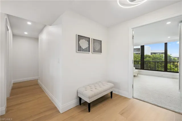 a living room with a couch and a window