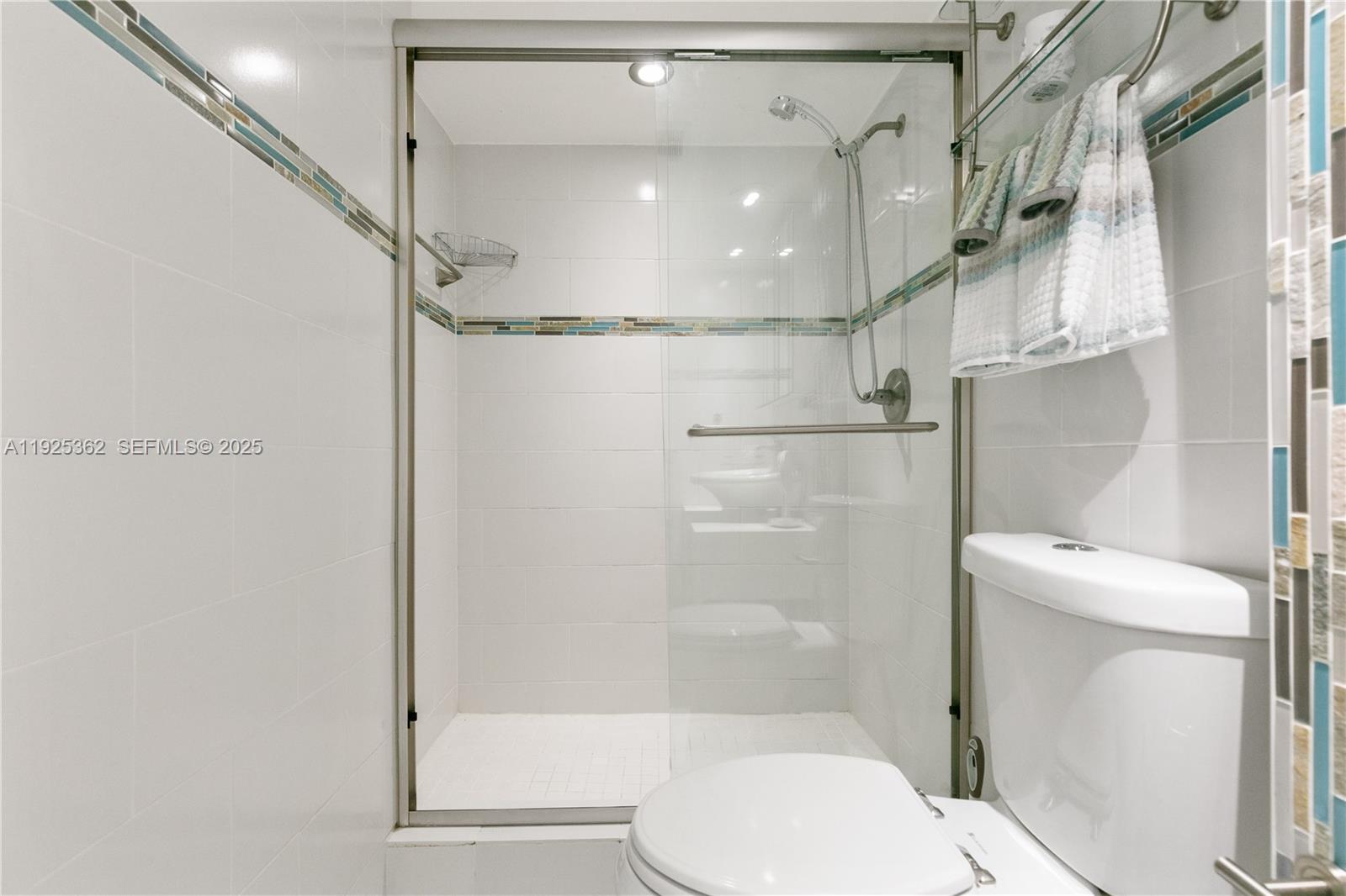 1900 North Victoria Park Road Fort Lauderdale, FL 33305 - Photo 21 of 60 a bathroom with a toilet and a shower