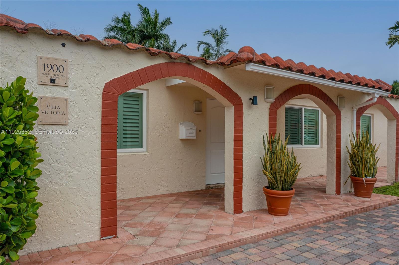 1900 North Victoria Park Road Fort Lauderdale, FL 33305 - Photo 56 of 60 a view of a house with potted plants