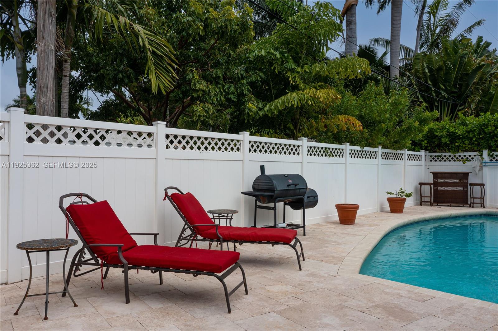 1900 North Victoria Park Road Fort Lauderdale, FL 33305 - Photo 58 of 60 a view of a chairs and tables in the patio