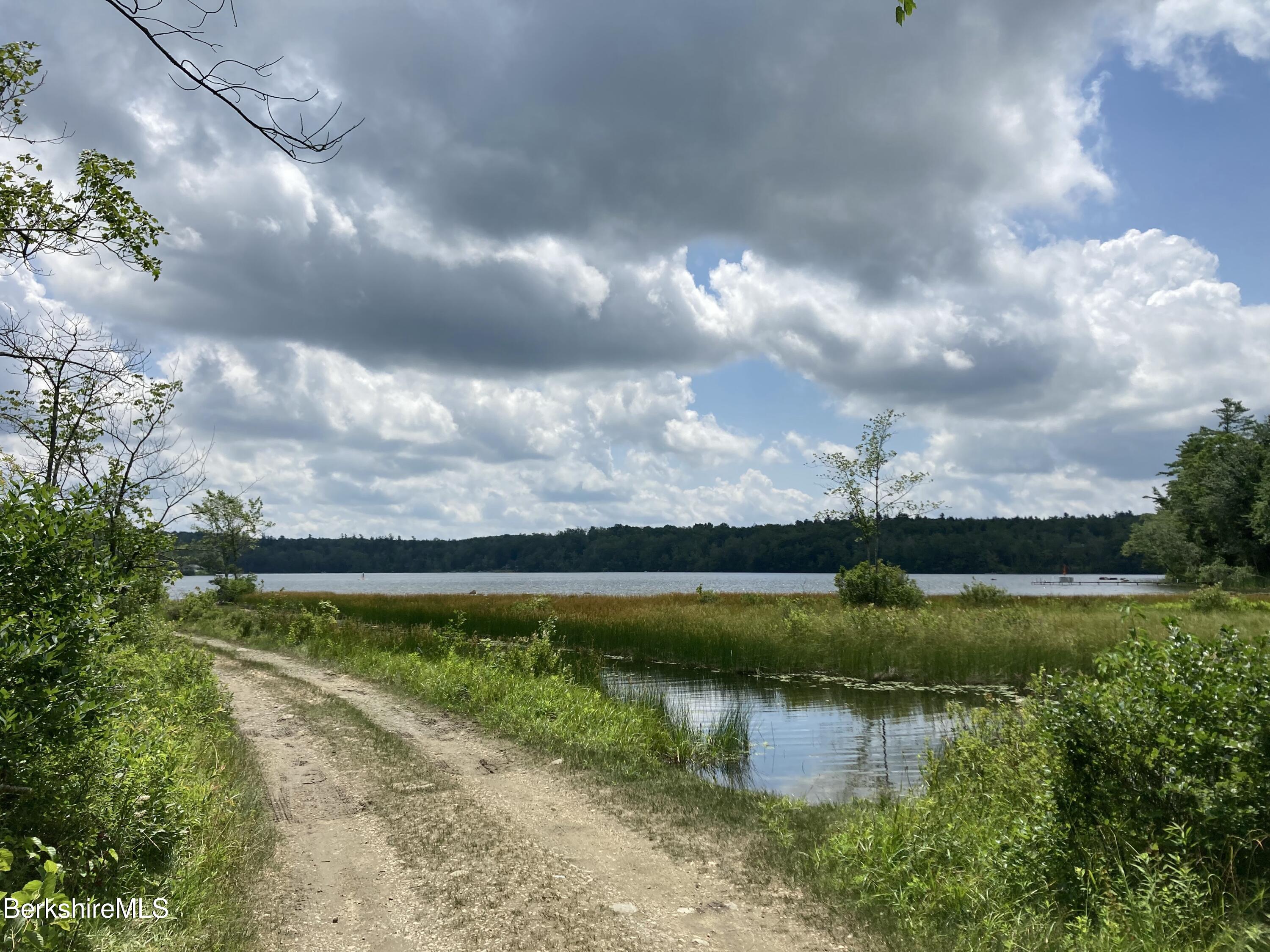 Lot 32 Leonhardt Road Becket, MA 01223 - Photo 6 of 9 a view of a lake in middle of the forest