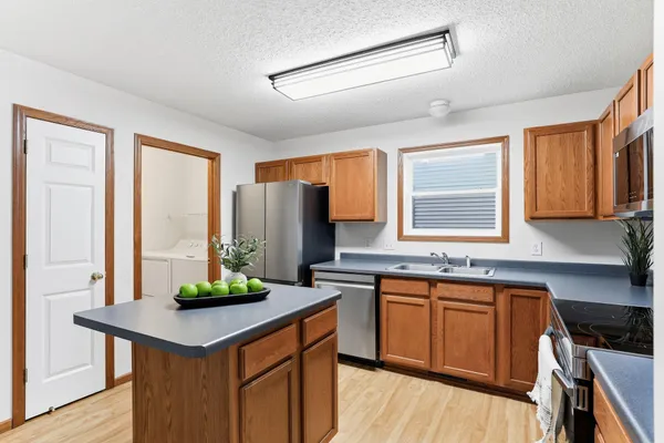 $300,000 | 7398 Brunswick Avenue North, Brooklyn Park, MN 55443