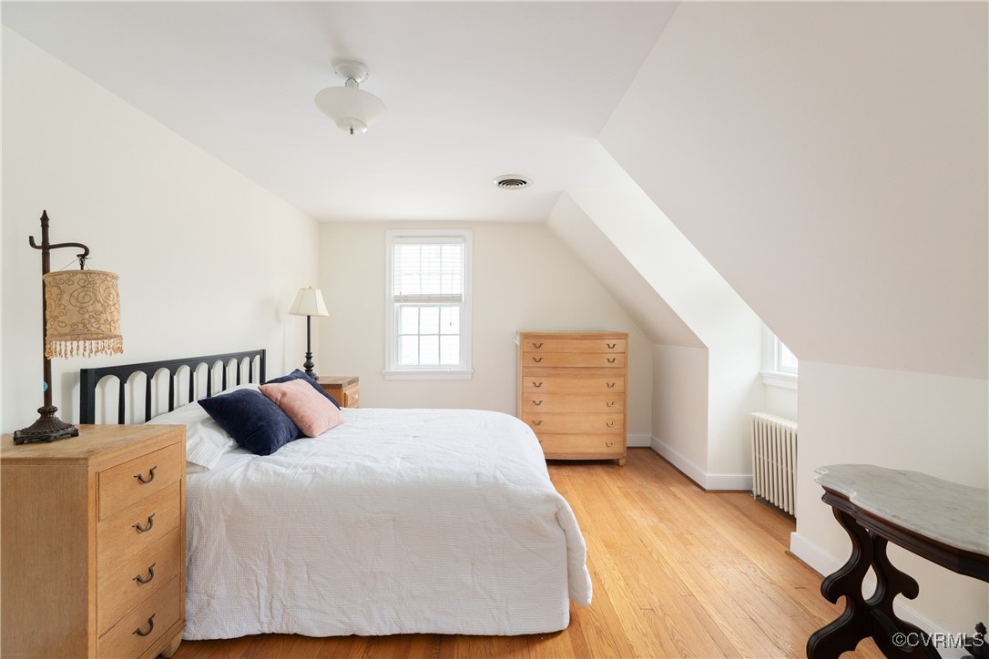 5217 Sylvan Road Richmond, VA 23225 - Photo 21 of 46 a bedroom with a bed and a window