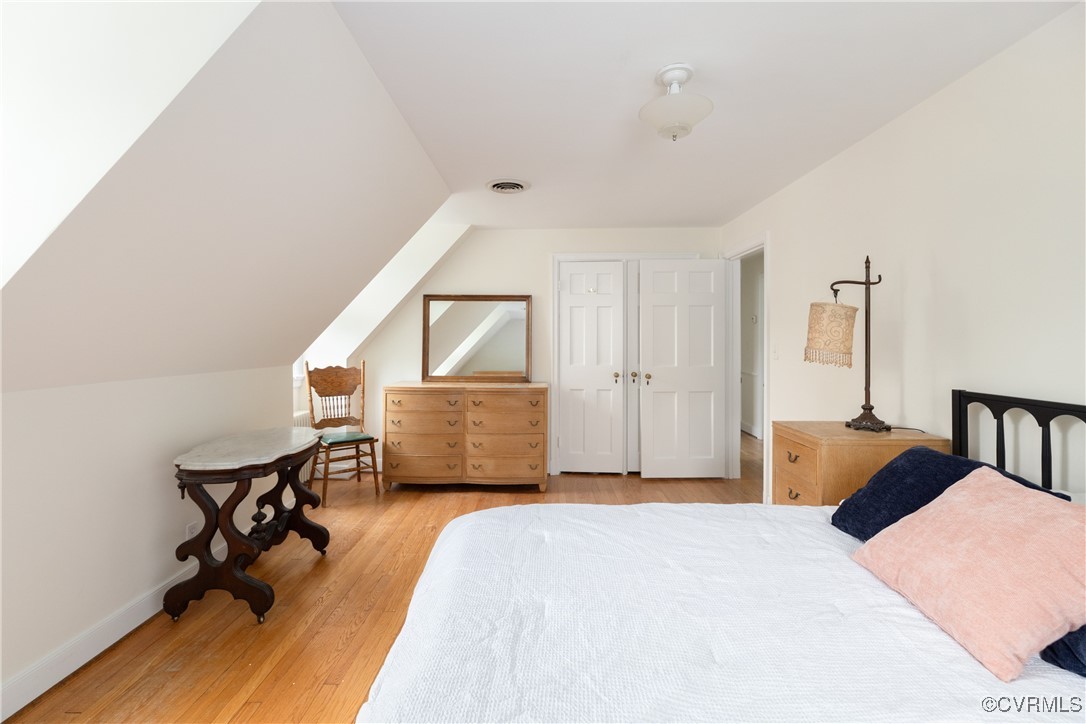 5217 Sylvan Road Richmond, VA 23225 - Photo 22 of 46 a bedroom with furniture and a window