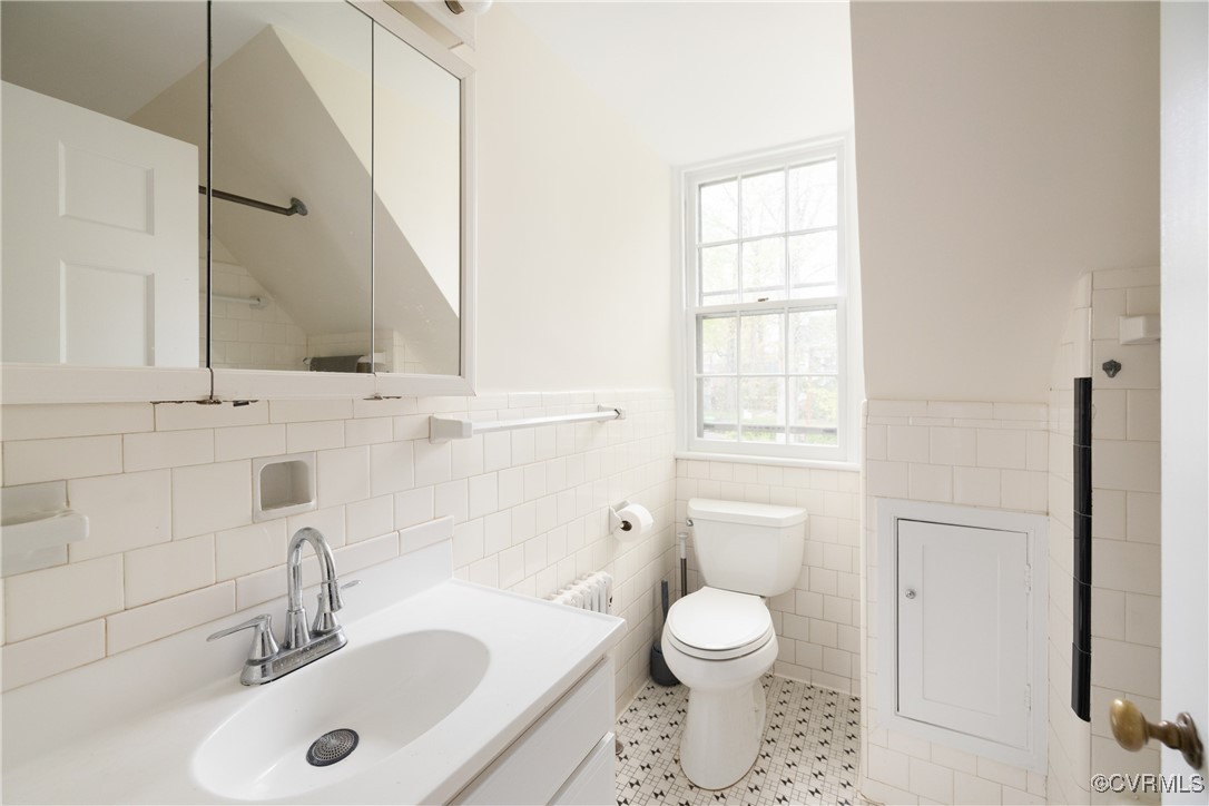 5217 Sylvan Road Richmond, VA 23225 - Photo 25 of 46 a bathroom with a sink toilet and shower