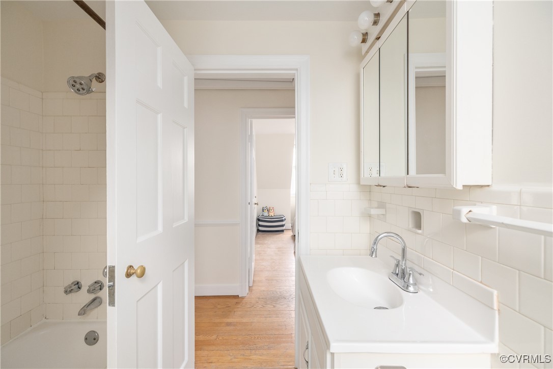 5217 Sylvan Road Richmond, VA 23225 - Photo 26 of 46 a bathroom with a sink and a mirror