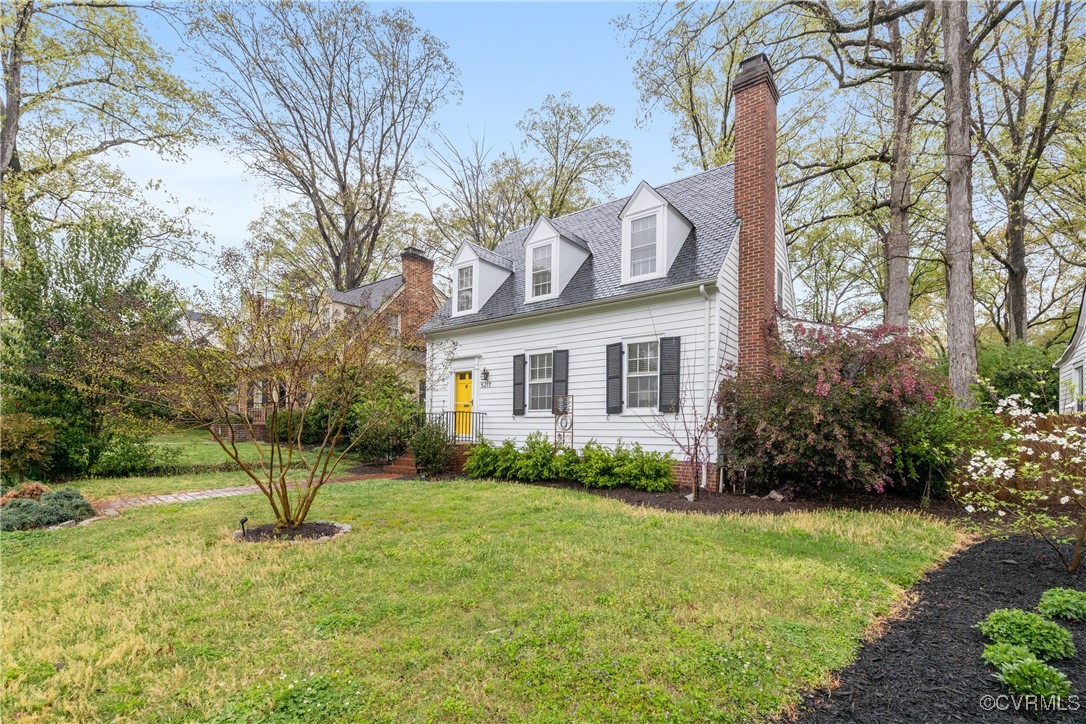 5217 Sylvan Road Richmond, VA 23225 - Photo 3 of 46 a view of a house with a garden