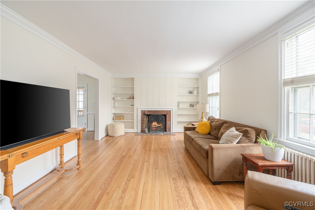 5217 Sylvan Road Richmond, VA 23225 - Photo 9 of 46 a living room with furniture and a flat screen tv