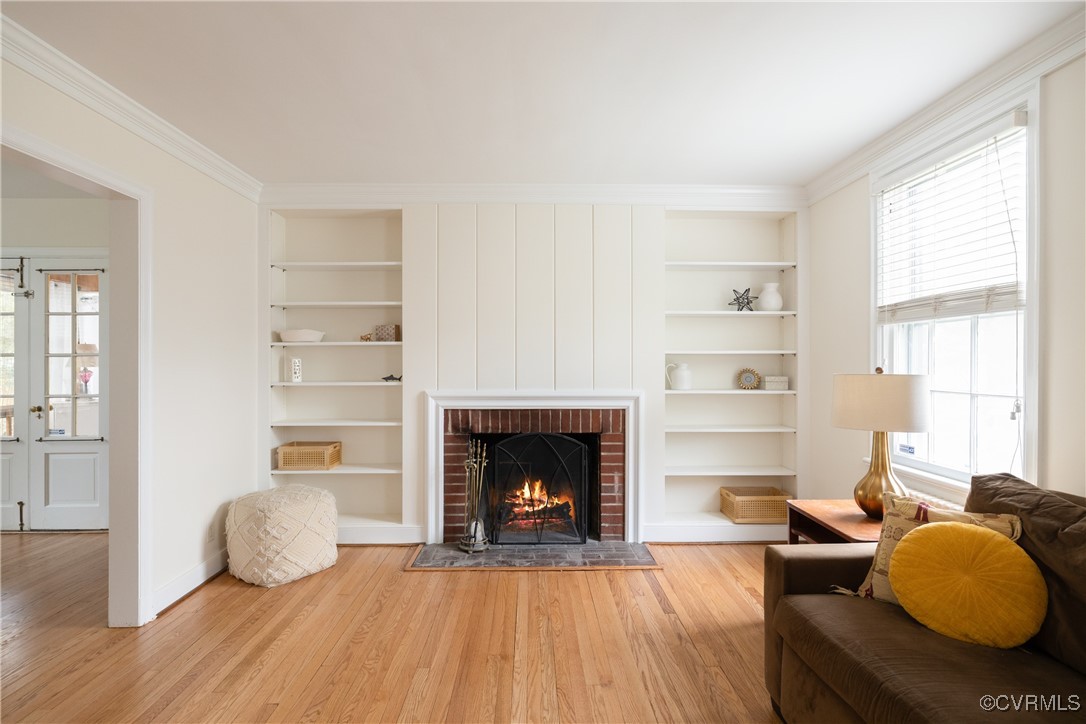 5217 Sylvan Road Richmond, VA 23225 - Photo 10 of 46 a living room with furniture and a fireplace