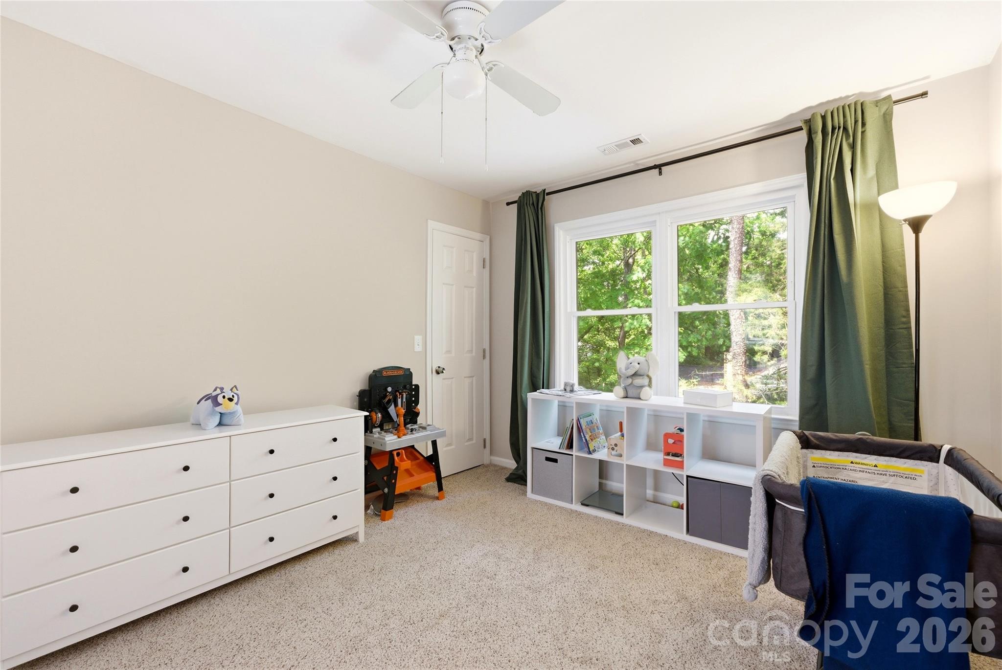 3066 Point Clear Drive Fort Mill, SC 29708 - Photo 26 of 47 a bedroom with furniture and a window