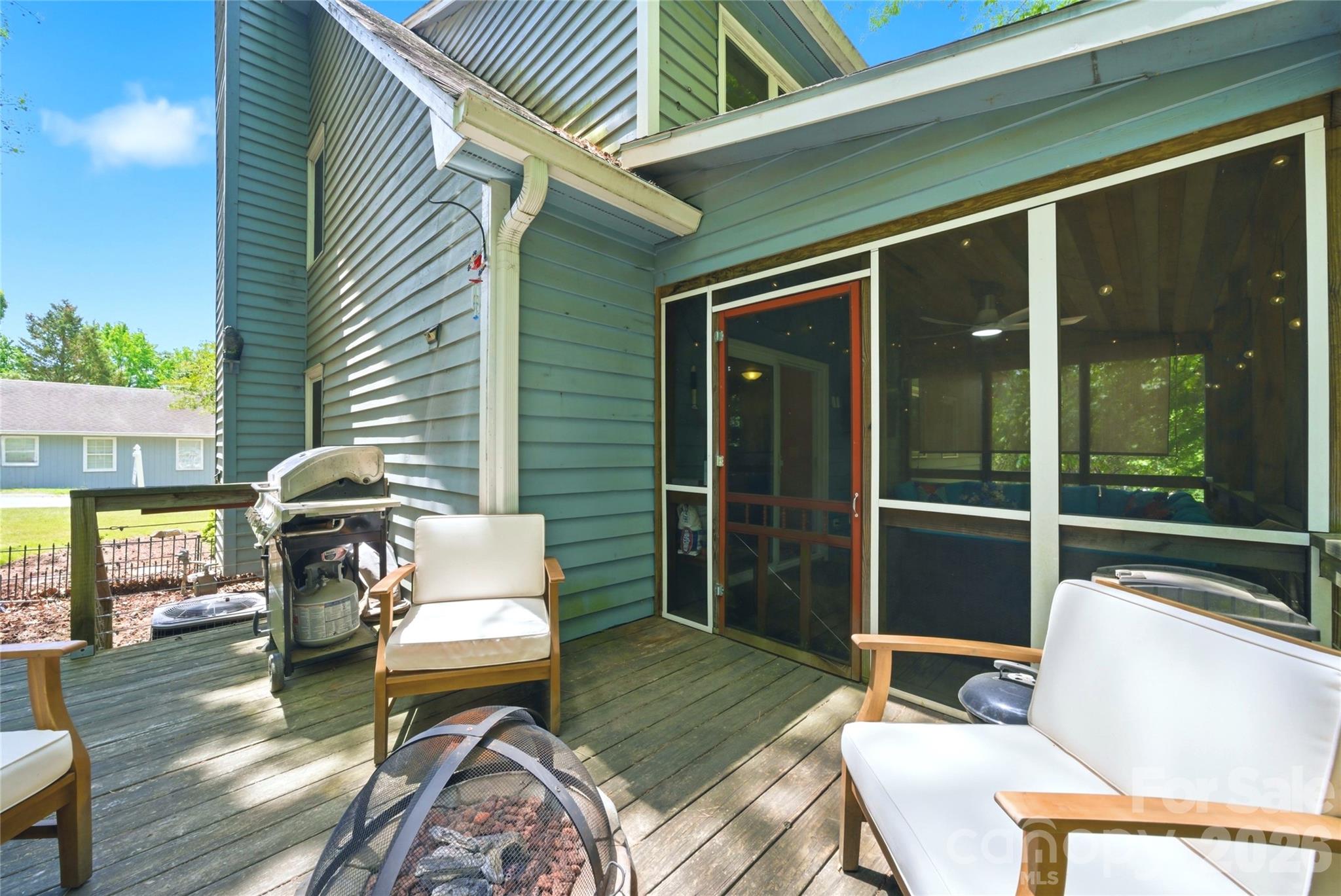 3066 Point Clear Drive Fort Mill, SC 29708 - Photo 39 of 47 a patio with couches table and chairs and potted plants