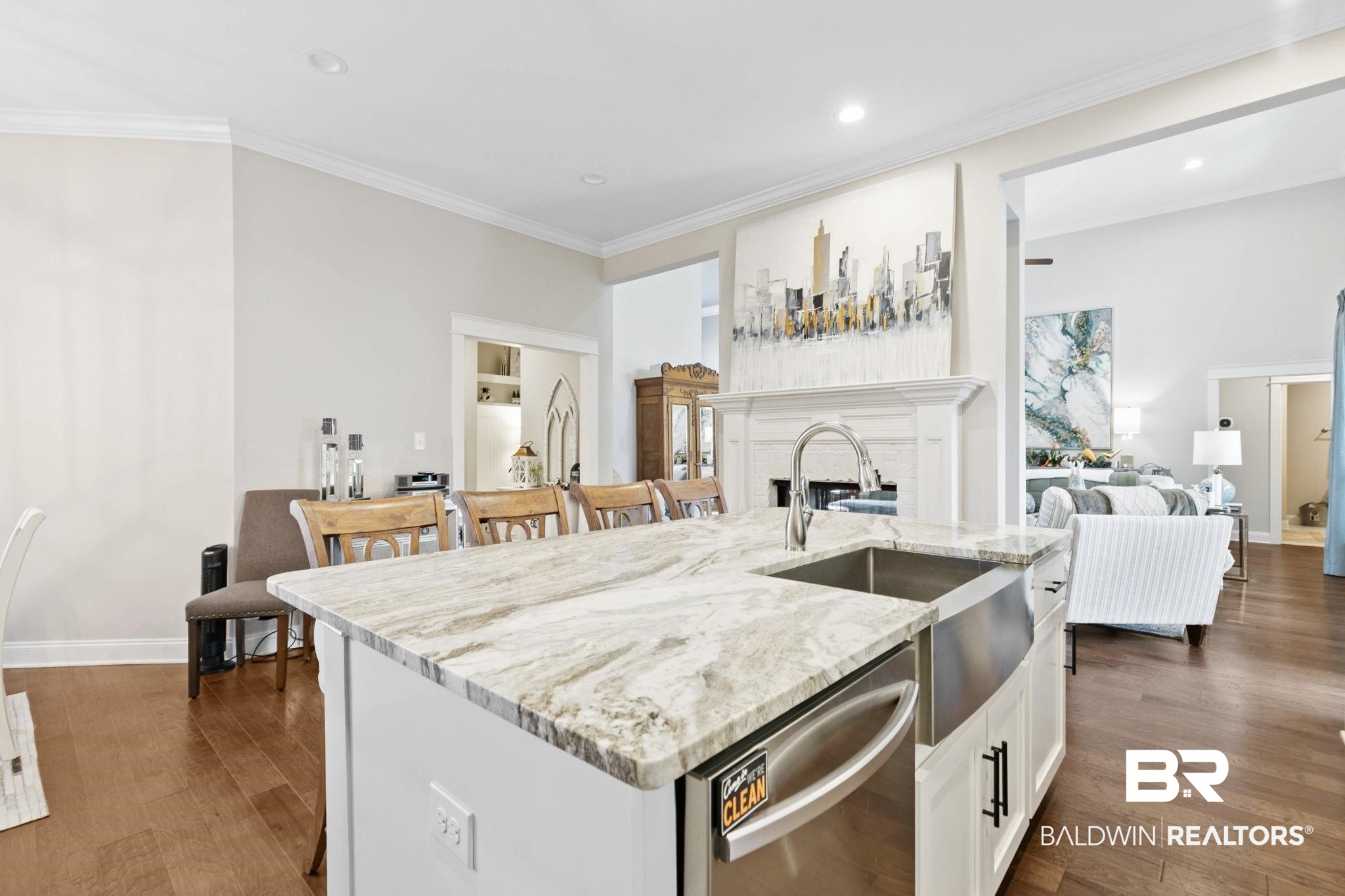 291 Hemlock Drive Fairhope, AL 36532 - Photo 20 of 65 Kitchen featuring stainless steel dishwasher, crown molding, light stone countertops, white cabinetry, and dark wood-type flooring