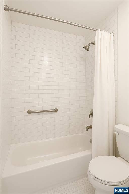 280 South Prospect Avenue, Unit 3N Hackensack, NJ 07601 - Photo 19 of 27 a white toilet sitting next to a bath tub