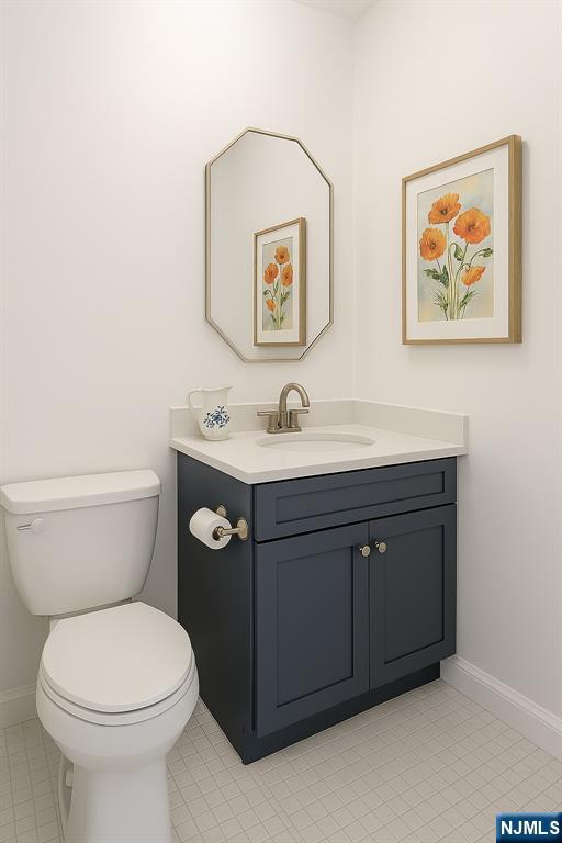 280 South Prospect Avenue, Unit 3N Hackensack, NJ 07601 - Photo 20 of 27 a bathroom with a toilet a sink and mirror